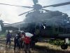 Dengan Teknik Hovering, Helikopter Caracal TNI AU Salurkan 1 Ton Bantuan Kemanusiaan di Gayo Lues, Aceh